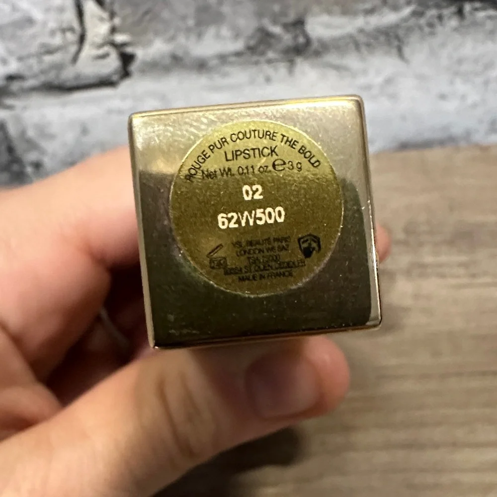 EUC Yves Saint Laurent Black and Gold Lipstick